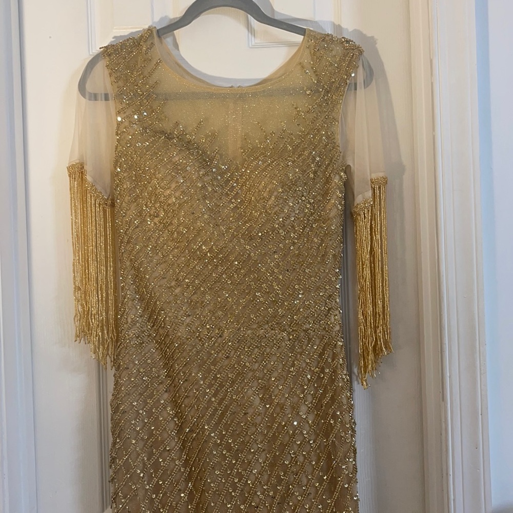 Lara designs gold beaded heavy gown